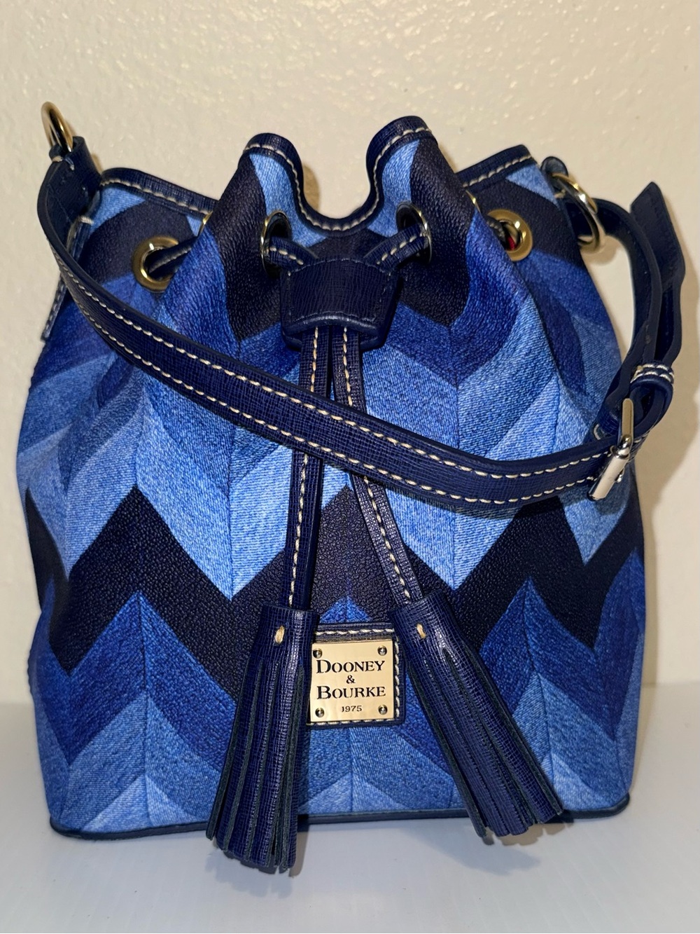 Dooney & Bourke Blue Chevron Drawstring Bucket Bag with Tassels